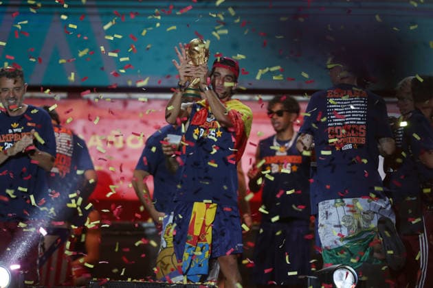 July 20, 2026, Madrid, Madrid, Spain: Spanish forward FERRAN TORRES kisses and lifts the 2026 World Cup trophy surrounded by his teammates on the celebration stage at Plaza de Cibeles. Despite facing heavy public criticism for his performance during the early matches of the tournament, FERRAN TORRES secured his place in Spanish soccer history by scoring the historic winning goal in the 106th minute of the final against Argentina. Up to two million fans flooded the streets of the capital, with 120,000 supporters packing the iconic square, to honor the national team, Nationalteam and witness their heroes commemorate the much-anticipated conquest of their second star. Madrid Spain - ZUMAo127 20260720_zep_o127_243 Copyright: xHugoxOrtunox