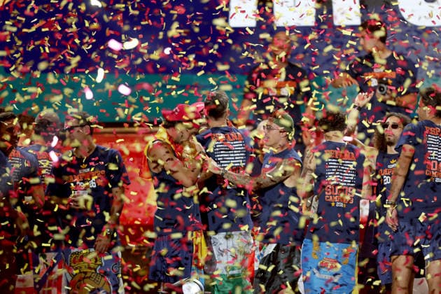 July 20, 2026, Madrid, Madrid, Spain: Spanish forward FERRAN TORRES kisses and lifts the 2026 World Cup trophy surrounded by his teammates on the celebration stage at Plaza de Cibeles. Despite facing heavy public criticism for his performance during the early matches of the tournament, FERRAN TORRES secured his place in Spanish soccer history by scoring the historic winning goal in the 106th minute of the final against Argentina. Up to two million fans flooded the streets of the capital, with 120,000 supporters packing the iconic square, to honor the national team, Nationalteam and witness their heroes commemorate the much-anticipated conquest of their second star. Madrid Spain - ZUMAo127 20260720_zep_o127_269 Copyright: xHugoxOrtunox