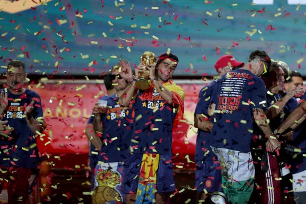 July 20, 2026, Madrid, Madrid, Spain: Spanish forward FERRAN TORRES kisses and lifts the 2026 World Cup trophy surrounded by his teammates on the celebration stage at Plaza de Cibeles. Despite facing heavy public criticism for his performance during the early matches of the tournament, FERRAN TORRES secured his place in Spanish soccer history by scoring the historic winning goal in the 106th minute of the final against Argentina. Up to two million fans flooded the streets of the capital, with 120,000 supporters packing the iconic square, to honor the national team, Nationalteam and witness their heroes commemorate the much-anticipated conquest of their second star. Madrid Spain - ZUMAo127 20260720_zep_o127_259 Copyright: xHugoxOrtunox