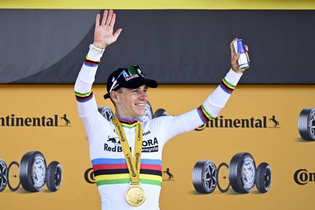 Belgian Remco Evenepoel of Red Bull-BORA-hansgrohe pictured on the podium after winning the stage 16 of the 2026 Tour de France cycling race, an individual Time Trial stage of 26km from Evian-les-Bains to Thonon-les-Bains, on Tuesday 21 July 2026. The 113th edition of the Tour de France starts on Saturday 4 July in Barcelona, Spain, and will finish in Paris, France on the 26th of July. JASPERxJACOBS  x181690299x