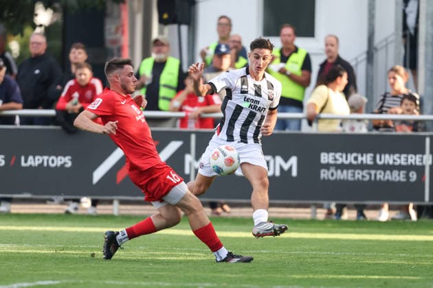 Toto-Pokal - VfB Forstinning - FC Ingolstadt 04; Zweikampf Kampf um den Ball Emre Gül (5, FCI) 16 Mancusi, Luca (16) Toto Pokal - FC Ingolstadt 04 VfB Forstinning Saison 2026 2027 *** Toto Cup: VfB Forstinning vs. FC Ingolstadt 04; Tackle; Battle for the Ball; Emre Gül 5, FCI 16 Mancusi, Luca 16; Toto Cup: FC Ingolstadt 04 vs. VfB Forstinning; 2026–2027 Season