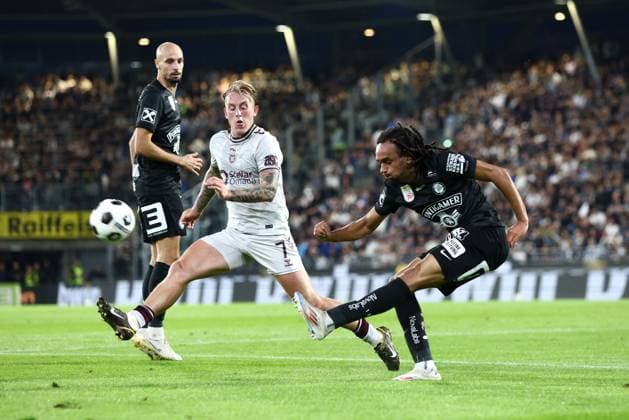Emran Soglo of SK Sturm Graz and Calvin Miller of Heart of Midlothian Sturm Graz v Heart of Midlothian, UEFA Champions League, 2nd Qualifying Round, 1st Leg, Football,Stadion Graz-Liebenau, Graz, Austria - 21 Jul 2026Graz Stadion Graz-Liebenau Austria  Copyright: xNikolaxKrstic Shutterstockx 16999234ax
