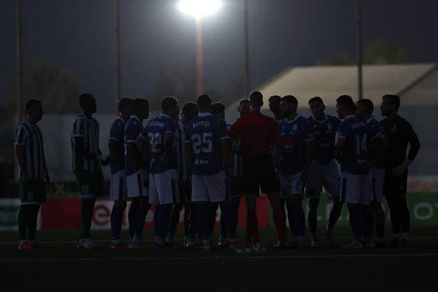 UEFA appointed match referee Marius Hansen Grotta (centre) speaks to players form both teams amid a power failure which was restored later during the UEFA Conference League Second qualifying round, 1st Leg match between Floriana and Drita at Centenary Stadium, Ta Qali, Malta on 21 July, 2026. (Photo by Domenic Aquilina) Floriana v Drita - UEFA Conference League Second Qualifying Round 1st Leg
