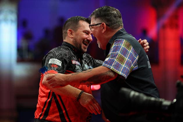 RECORD DATE NOT STATED 21st July 2026, Winter Gardens, Blackpool, Lancashire, England; 2026 Betfred World Matchplay Darts, Day Four; Jonny Clayton and Gary Anderson shake hands ahead of the game AidanxHunter