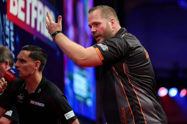 RECORD DATE NOT STATED 21st July 2026, Winter Gardens, Blackpool, Lancashire, England; 2026 Betfred World Matchplay Darts, Day Four; Dirk van Duijvenbode reacts after missing a dart during his game against Michael van Gerwen AidanxHunter