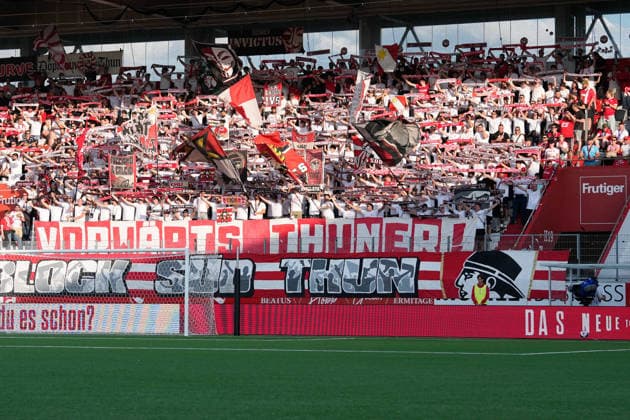 Thun, Switzerland - July 21: Fans of FC Thun with Flags and Banner during the UEFA Champions League Qualification match between FC Thun and GNK Dinamo Zagreb at VISANA Stadion on July 21, 2026 in Thun, Switzerland.  Copyright: xKjetilxWaberx xSPPx Sportspressphoto_SPR194982