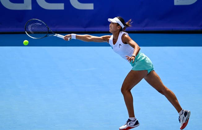 Carol Young Suh Lee of USA returns a ball to Marie Bouzkova of Czech Republic during the women s WTA, Tennis Damen 250 Livesport Prague Open 2026 tennis tournament match, on July 22, 2026, in Prague, Czech Republic. (CTKxPhoto RomanxVondrous) CTKPhotoP2026072203495  CTKPhotoP2026072203495