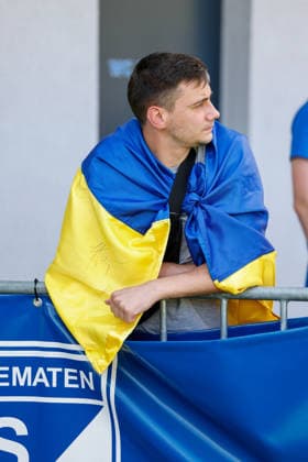 SOCCER - Schalke vs Kharkiv, test match KEMATEN,AUSTRIA,22.JUL.26 - SOCCER - 1. DFL, 1. Deutsche Bundesliga, Premjer-Liha, FC Schalke 04 vs FC Kharkiv, test match. Image shows a fan of Kharkiv.  GEPAxpictures xMarkoxVulic