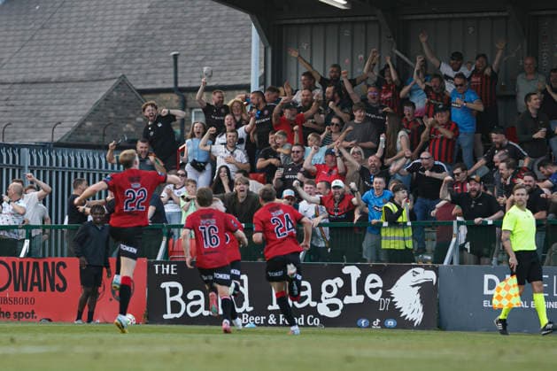 Players and fans of Bohemians seen celebrating after scoring goal during UEFA Conference League qualifying game between teams of Bohemians FC and FC Ballkani (Maria Eduarda Lopes Ball Raw Images) Dublin Dalymount Park Ireland Copyright: xMariaxEduardaxLopesx mariaeduarda_bohemians_fcballkani_2627_3-18