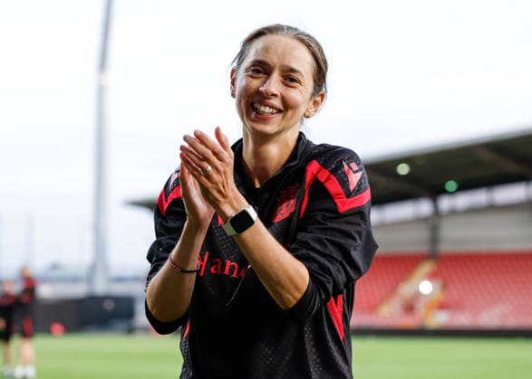 Wrexham, Wales, 22nd July 2026. Jenny Sugarman manager of Wrexham celebrates the full time result following the Pyunik v Wrexham Women UEFA Womens Champions League Qualifying match at The Racecourse, Wrexham. Picture credit should read: Cody Froggatt Sportimage EDITORIAL USE ONLY. No use with unauthorised audio, video, data, fixture lists, club league logos or live services. Online in-match use limited to 120 images, no video emulation. No use in betting, games or single club league player publications. SPI_031_CF_PYUNIK_V_WREXHAM_WOMEN SPI-4881-0031