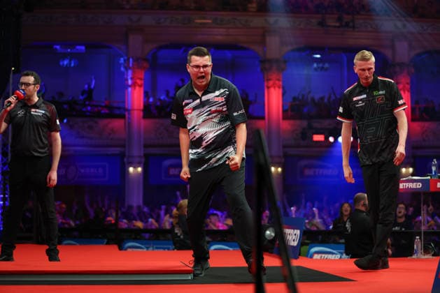 RECORD DATE NOT STATED 22nd July 2026, Winter Gardens, Blackpool, Lancashire, England; 2026 Betfred World Matchplay Darts, Day Five; Gian van Veen celebrates after winning his game as Wessel Nijman looks on AidanxHunter