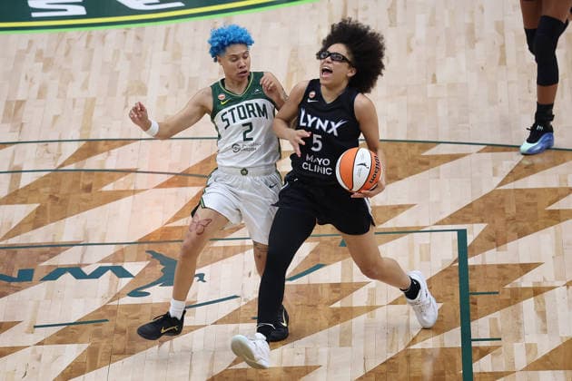July 22, 2026, Seattle, Washington, USA: Minnesota Lynx guard OLIVIA MILES (5) controls the ball while defended by Seattle Storm guard NATISHA HIEDEMAN (2) in the first quarter of the WNBA, Basketball Damen, USA match between the Seattle Storm and Minnesota Lynx at Climate Pledge Arena in Seattle. WNBA 2026: Minnesota 86:76 Seattle  - ZUMAd218 20260722_zsp_d218_003 Copyright: xRichardxDizonx