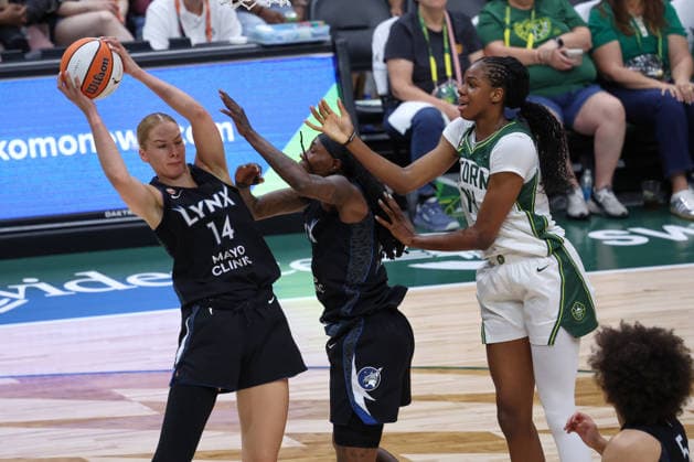 July 22, 2026, Seattle, Washington, USA: Minnesota Lynx forward DORKA JUHASZ (14) pulls down a rebound in the third quarter of the WNBA, Basketball Damen, USA match between the Seattle Storm and Minnesota Lynx at Climate Pledge Arena in Seattle. WNBA 2026: Minnesota 86:76 Seattle  - ZUMAd218 20260722_zsp_d218_009 Copyright: xRichardxDizonx