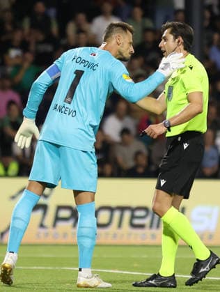 22.07.2026 Pancevo(Serbia) FK Zeleznicar Pancevo-SC Braga Conference League third leg qualifiers Zoran Popovic(L) Zeleznicar Pancevo goalkeeper react to Mehmet Turkmen (R) Turkish referee :S.Sandic