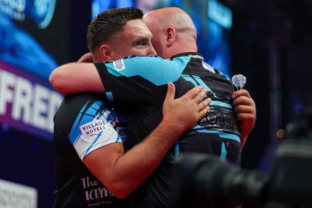 RECORD DATE NOT STATED 22nd July 2026, Winter Gardens, Blackpool, Lancashire, England; 2026 Betfred World Matchplay Darts, Day Five; Gerwyn Price and Rob Cross hug at the end of the game in which Gerwyn Price won AidanxHunter