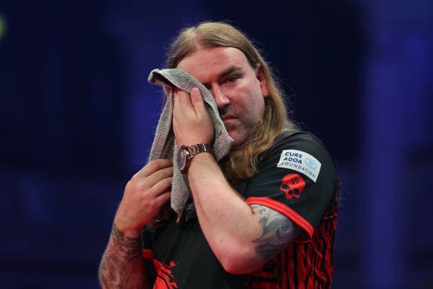 RECORD DATE NOT STATED 22nd July 2026, Winter Gardens, Blackpool, Lancashire, England; 2026 Betfred World Matchplay Darts, Day Five; Ryan Searle wiping his face with a towel AidanxHunter