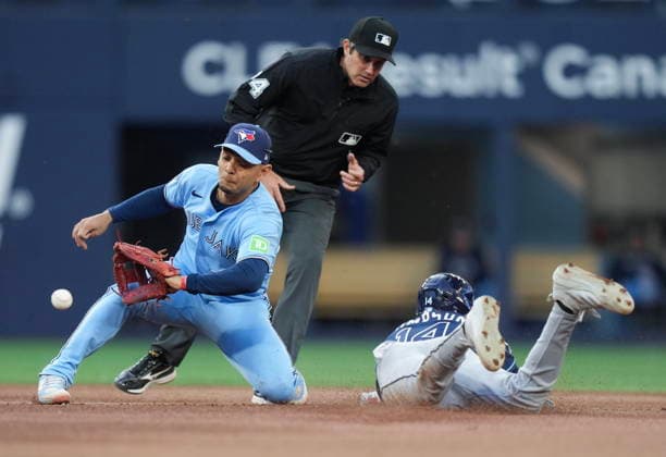 July 22, 2026, Toronto, On, CANADA: Tampa Bay Rays Chandler Simpson (14) steals second base ahead of the tag by Toronto Blue Jays shortstop Andres Gimenez (0) during fourth inning MLB, Baseball Herren, USA baseball action in Toronto on Wednesday, July 22, 2026. Canada News - July 22, 2026  - ZUMAc35_ 20260722_zaf_c35_118 Copyright: xNathanxDenettex