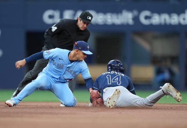 July 22, 2026, Toronto, On, CANADA: Tampa Bay Rays Chandler Simpson (14) steals second base ahead of the tag by Toronto Blue Jays shortstop Andres Gimenez (0) during fourth inning MLB, Baseball Herren, USA baseball action in Toronto on Wednesday, July 22, 2026. Canada News - July 22, 2026  - ZUMAc35_ 20260722_zaf_c35_119 Copyright: xNathanxDenettex