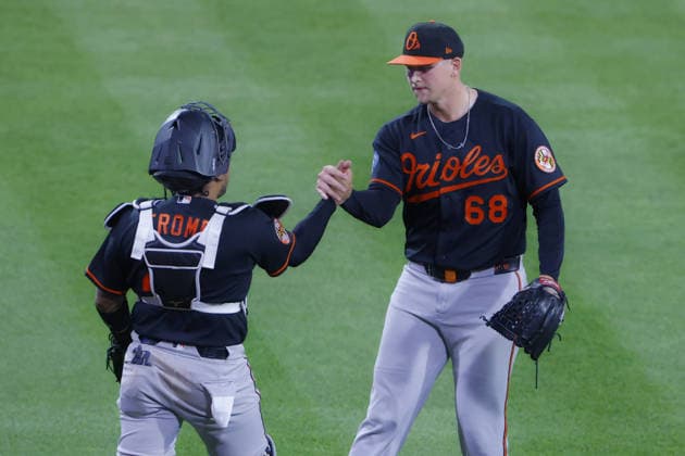 Baltimore Orioles catcher Chadwick Tromp celebrates the Baltimore Orioles win over Boston Red Sox with Baltimore Orioles pitcher Tyler Wells at Fenway Park in Boston, Massachusetts on Wednesday, July 22, 2026.  BOP20260722021 CJxGUNTHER