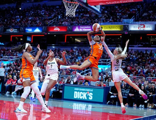 INDIANAPOLIS, IN - JULY 22: Connecticut Sun forward Nell Angloma (33) takes a shot against Indiana Fever guard Sophie Cunningham (8) on July 22, 2026, at Gainbridge Fieldhouse in Indianapolis, Indiana. (Photo by Brian Spurlock Icon Sportswire) WNBA, Basketball Damen, USA JUL 22 Connecticut Sun at Indiana Fever EDITORIAL USE ONLY Icon26072237