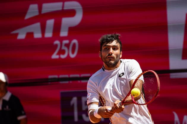 Millennium Estoril Open 2026 at Clube de Tenis do Estoril in Cascais, Portugal - 22 JULY 2026. Roman Burruchaga of Argentina seen in action during the tennis match between Nuno Borges of Portugal (not in view) and Roman Burruchaga of Argentina during the Millennium Estoril Open 2026 at Clube de Tenis do Estoril. Alexander Blocky won 3-6, 6-4, 7-6 Cascais Portugal Copyright: xHenriquexCasinhasx xSOPAxImagesx HCASINHAS_22072026_ESTORILOPEN_ATP250_003