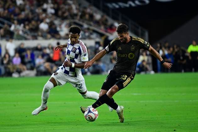 July 22, 2026, Los Angeles, California, USA: LOS ANGELES, CA - JULY 22, 2026: Defender Yevhen Cheberko (23) of LAFC and Midfielder Zavier Gozo (72) of Real Salt Lake battle for the ball during an MLS, Fussball Herren, USA regular season match at BMO Stadium on July 22, 2026 in Los Angeles, California. CA: MLS - LAFC Vs Real Salt Lake  - ZUMAs197 20260722_aaa_s197_480 Copyright: xWestonxHancockx