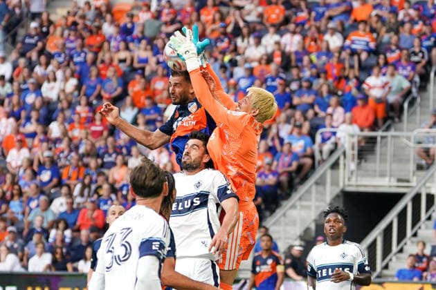 July 22, 2026, Cincinnati, Ohio, USA: Vancouver Whitecaps goalkeeper Yohei Takaoka (1) and FC Cincinnati defense Matt Miazga (21) jump for a loose ball in the air during an MLS, Fussball Herren, USA game at TQL Stadium Soccer 2026:FC Cincinnati V Vancouver Whitecaps  - ZUMAt168 20260722_zsp_t168_012 Copyright: xTrentxPattersonx