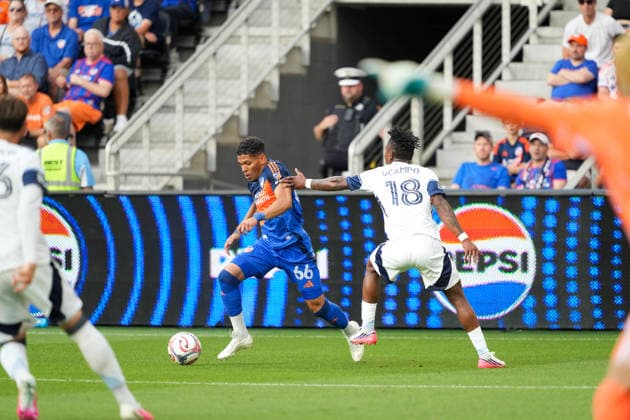 July 22, 2026, Cincinnati, Ohio, USA: Vancouver Whitecaps defender o°dier Ocampo (18) attempts to stop FC Cincinnati offense Ender Echenique (66) from passing the ball that leads to a goal during an MLS, Fussball Herren, USA game at TQL Stadium Soccer 2026:FC Cincinnati V Vancouver Whitecaps  - ZUMAt168 20260722_zsp_t168_040 Copyright: xTrentxPattersonx