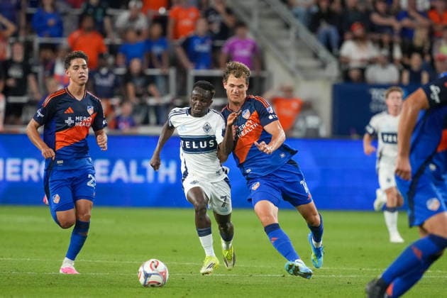 July 22, 2026, Cincinnati, Ohio, USA: FC Cincinnati offense Tom Barlow (16) and Vancouver Whitecaps forward Cheikh Tidiane Sabaly (7) go shoulder to shoulder trying to win the ball during an MLS, Fussball Herren, USA game at TQL Stadium Soccer 2026:FC Cincinnati V Vancouver Whitecaps  - ZUMAt168 20260722_zsp_t168_048 Copyright: xTrentxPattersonx