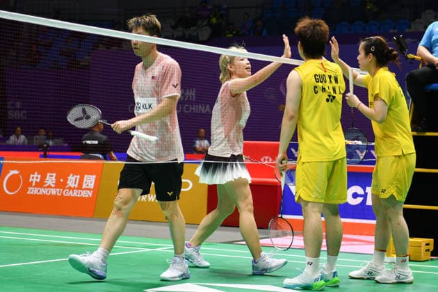 CHANGZHOU, CHINA - JULY 23: Guo Xinwa and Chen Fanghui of China react in the Mixed Doubles Round of 16 match against Goh Soon Huat and Shevon Jemie Lai of Malaysia on day 3 of the China Open 2026 at Changzhou Olympic Sports Center Gymnasium on July 23, 2026 in Changzhou, Jiangsu Province of China.  Copyright: xVCGx 111655927005