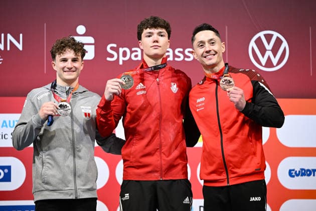 Siegerehrung - Radomyr Stelmakh (SC Cottbus Turnen) gewinnt vor Alexander Kunz (TSV Pfuhl) und Andreas Toba (Turn-Klubb zu Hannover 1858) DIE FINALS 2026 - Deutsche Meisterschaften Geraeteturnen Mehrkampf Maenner, 23.07.2026 DIE FINALS 2026 - Deutsche Meisterschaften Geraeteturnen Mehrkampf Maenner, 23.07.2026 Hannover *** Awards Ceremony: Radomyr Stelmakh (SC Cottbus Turnen) wins ahead of Alexander Kunz (TSV Pfuhl) and Andreas Toba (Turn Klubb zu Hannover 1858) at THE FINALS 2026 German Artistic Gymnastics All-Around Championships for Men, July 23, 2026 THE FINALS 2026 German Artistic Gymnastics Championships Men’s All-Around, July 23, 2026 Hanover Copyright: xEibner-Pressefoto xHoepnerx EP_PHR