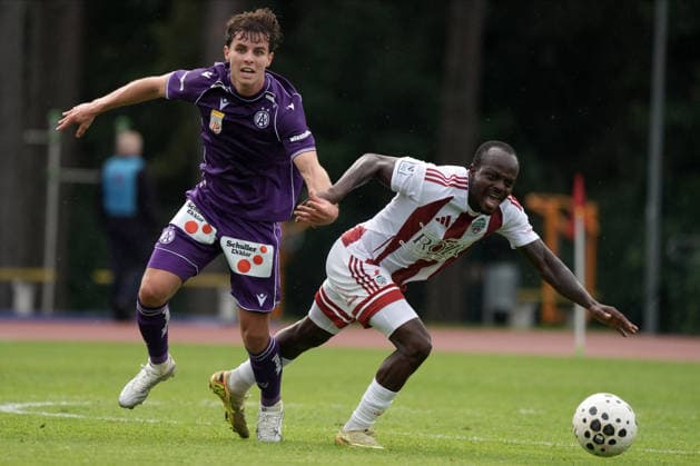 Latvia Soccer FK Liepaja Austria Wien, Riga, Latvia, 23.07.2026, football, soccer Florian Wustinger of FK Austria Wien and Abiodun OGUNNIYI of FK Liepaja in action during the UEFA Europa Conference League qualifying round game between Latvia™s FK Liepaja and Austria Wien komandam in Sloka, Latvia 23.07.2026. Photo: Roman Koksarov (RKF) Riga Latvia Copyright: xRomanxKoksarovx RKV00448.JPG