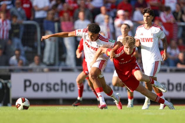 Jahmai Simpson-Pusey (1. FC Köln) und Finn Stromberg (SV Bergisch Gladbach 09) im Zweikampf waehrend des Testspiels zwischen 1. FC Köln und SV Bergisch Gladbach 09, Belkaw Arena am 23. July 2026 in Bergisch Gladbach, Deutschland. (Foto von Oliver Kaelke DeFodi Images) +++ Jahmai Simpson-Pusey (1. FC Köln) und Finn Stromberg (SV Bergisch Gladbach 09) battle for the ball during the friendly match between 1. FC Köln and SV Bergisch Gladbach 09 at Belkaw Arena on July 23, 2026 in Bergisch Gladbach, Germany. (Photo by Oliver Kaelke DeFodi Images) (Photo by Oliver Kaelke DeFodi Images) - *** Jahmai Simpson Pusey of 1 FC Köln and Finn Stromberg of SV Bergisch Gladbach 09 battle for the ball during the friendly match between 1 FC Köln and SV Bergisch Gladbach 09 at Belkaw Arena on July 23, 2026, in Bergisch Gladbach, Germany Photo by Oliver Kaelke DeFodi Images Jahmai Simpson Pusey of 1 FC Köln and Finn Stromberg of SV Bergisch Gladbach 09 battle for the ball during the friendly match between 1 FC Köln and SV Bergisch Gladbach 09 at Belkaw Arena on July 23, 2026 in Bergisch Gladbach, Germany Photo by Oliver Kaelke DeFodi Images Photo by Oliver Kaelke DeFodi Images