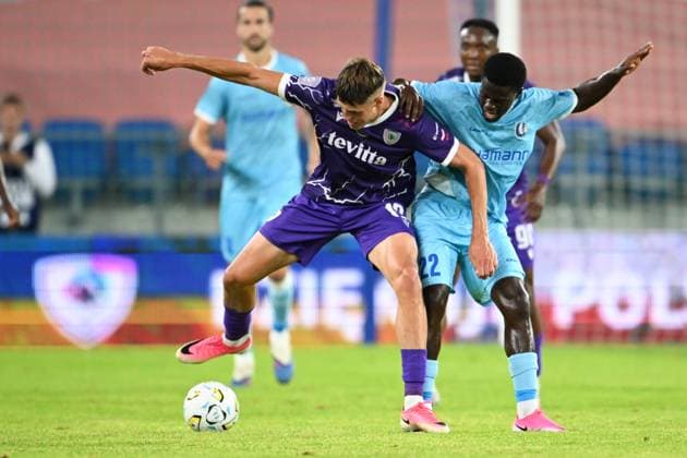 Cherkasy s Yevhenii Pastukh and Gent s Leonardo Lopes pictured in action during a soccer game between Ukrainian FC LNZ Cherkasy and Belgian KAA Gent, Thursday 23 July 2026 in Plock, Poland, the first leg of the second qualifying round for the UEFA Conference League. JILLxDELSAUX  x181871541x