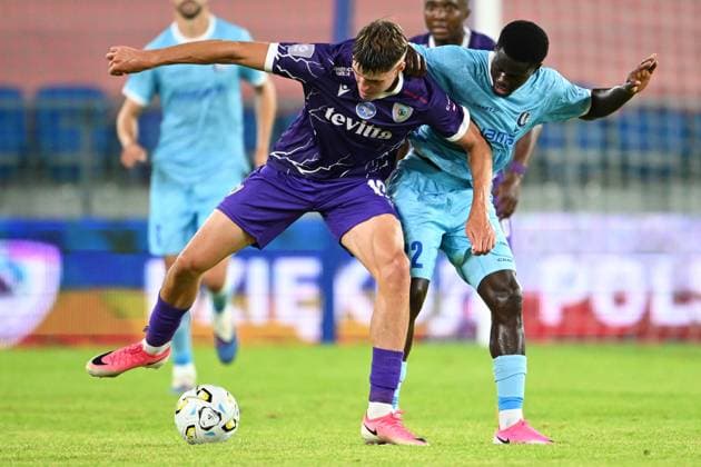 Cherkasy s Yevhenii Pastukh and Gent s Leonardo Lopes pictured in action during a soccer game between Ukrainian FC LNZ Cherkasy and Belgian KAA Gent, Thursday 23 July 2026 in Plock, Poland, the first leg of the second qualifying round for the UEFA Conference League. JILLxDELSAUX  x181871548x