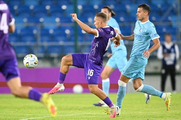 Cherkasy s Artur Riabov and Gent s Benes pictured in action during a soccer game between Ukrainian FC LNZ Cherkasy and Belgian KAA Gent, Thursday 23 July 2026 in Plock, Poland, the first leg of the second qualifying round for the UEFA Conference League. JILLxDELSAUX  x181874021x