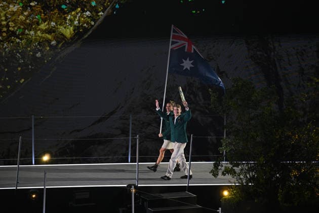 COM26 OPENING CEREMONY, Flag-bearer Nina Kennedy and carrying the King™s Baton Tim Hodge lead Australia into the stadium during the Opening Ceremony of the Glasgow 2026 Commonwealth Games at The Hydro in Glasgow, Scotland, Thursday, July 23, 2026. ( NO ARCHIVING, EDITORIAL USE ONLY GLASGOW UNITED KINGDOM  Copyright: xLUKASxCOCHx 20260724172200595351