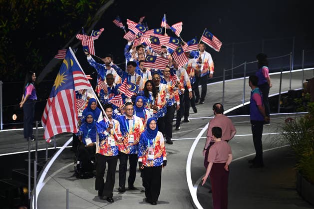 COM26 OPENING CEREMONY, Malaysia enter the stadium during the Opening Ceremony of the Glasgow 2026 Commonwealth Games at The Hydro in Glasgow, Scotland, Thursday, July 23, 2026. ( NO ARCHIVING, EDITORIAL USE ONLY GLASGOW UNITED KINGDOM  Copyright: xJOELxCARRETTx 20260724162960806250