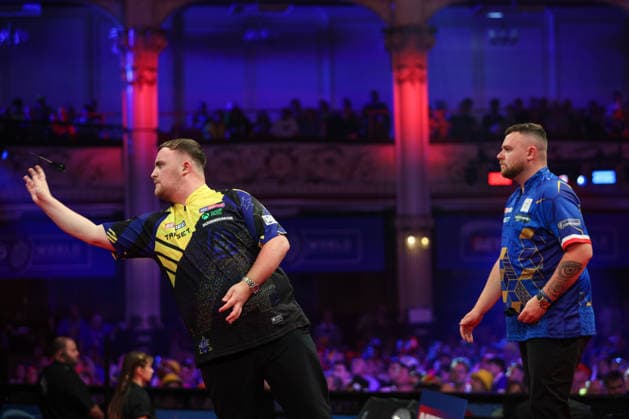RECORD DATE NOT STATED 23rd July 2026, Winter Gardens, Blackpool, Lancashire, England; 2026 Betfred World Matchplay Darts, Day Six; Luke Littler in action as Josh Rock looks on AidanxHunter