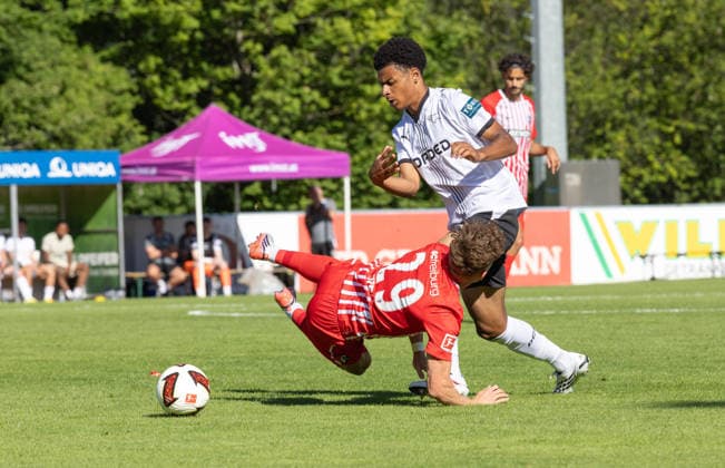 SOCCER - Freiburg vs Derby, test match IMST,AUSTRIA,24.JUL.26 - SOCCER - 1. DFL, 1. Deutsche Bundesliga, EFL Championship, SC Freiburg vs Derby County FC, test match. Image shows Remi Harvey (Derby County and Philipp Treu (Freiburg).  GEPAxpictures xMichaelxKristen