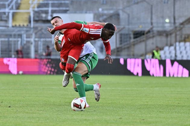 Regionalliga Bayern; FC Bayern München II - SC Eltersdorf; 24.07.2026 MUNICH, GERMANY - 24. JULY: im Duell Chris AFANOU (FC Bayern München II 7) und Yannik JASSMANN (SC Eltersdorf 9) während dem Match der Regionalliga Bayern zwischen den Amateuren des FC Bayern München und dem SC Eltersdorf am 1. Spieltag im Grünwalder Stadion *** Bavarian Regional League: FC Bayern Munich II vs. SC Eltersdorf, July 24, 2026, MUNICH, GERMANY July 24, in a matchup between Chris AFANOU (FC Bayern Munich II, No. 7) and Yannik JASSMANN (SC Eltersdorf, No. 9) during the Bavarian Regional League match between the FC Bayern Munich reserves and SC Eltersdorf on Matchday 1 at Grünwalder Stadium Copyright: xBEAUTIFULxSPORTS Goldbergx