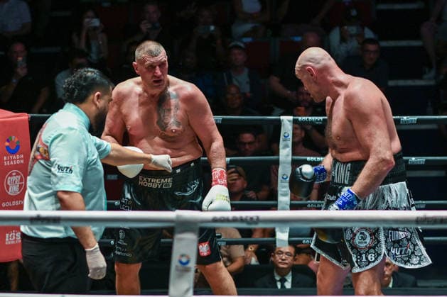 July 24, 2026, Pattaya, Chonburi, Thailand: Tyson Fury (L) and Mariusz Wach (R) exchanging punches during their heavyweight boxing bout. Tyson Fury defeats Mariusz Wach by corner retirement after seven rounds to win the WBC Humanitarian Belt at Max Muay Thai Stadium. Pattaya Thailand - ZUMAs197 20260724_aaa_s197_092 Copyright: xWasimxMatherx