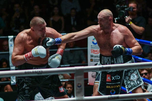 July 24, 2026, Pattaya, Chonburi, Thailand: Tyson Fury (L) and Mariusz Wach (R) exchanging punches during their heavyweight boxing bout. Tyson Fury defeats Mariusz Wach by corner retirement after seven rounds to win the WBC Humanitarian Belt at Max Muay Thai Stadium. Pattaya Thailand - ZUMAs197 20260724_aaa_s197_093 Copyright: xWasimxMatherx