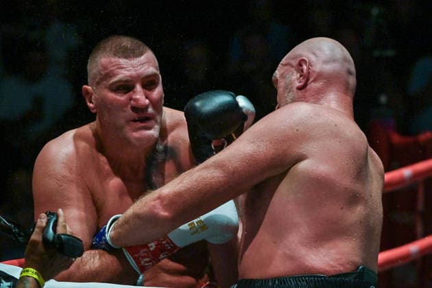 July 24, 2026, Pattaya, Chonburi, Thailand: Tyson Fury (L) and Mariusz Wach (R) exchanging punches during their heavyweight boxing bout. Tyson Fury defeats Mariusz Wach by corner retirement after seven rounds to win the WBC Humanitarian Belt at Max Muay Thai Stadium. Pattaya Thailand - ZUMAs197 20260724_aaa_s197_099 Copyright: xWasimxMatherx
