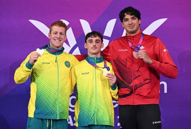COM26 SWIMMING FINALS, Gold medalist Alex Saffy of Australia, Silver medalist Col Pearse of Australia and Bronze medalist Jack Gill of Canada pose during the medal ceremony for the Men s 100m Butterfly S10 Final during the Glasgow 2026 Commonwealth Games at the Tollcross International Swimming Centre in Glasgow, Scotland, Friday, July 24, 2026. ( NO ARCHIVING, EDITORIAL USE ONLY Glasgow Scotland United Kingdom  Copyright: xDEANxLEWINSx 20260725143005459542