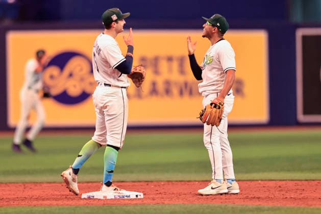 July 24, 2026, St. Petersburg, Florida, USA: Tampa Bay Rays infielders Ben Williamson (15) and Richie Palacios (1) congratulate one another on the win after an MLB, Baseball Herren, USA game against the Cleveland Guardians on July 24, 2026 at Tropicana Field. The Rays beat the Guardians 11-3. St. Petersburg USA - ZUMAh180 20260724_zsp_h180_076 Copyright: xKimxHukarix