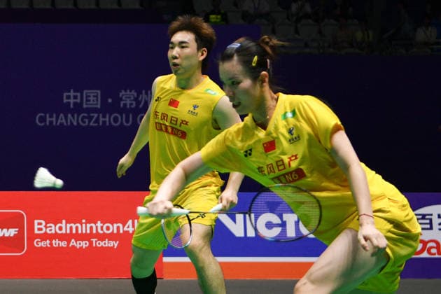 CHANGZHOU, CHINA - JULY 25: Guo Xinwa and Chen Fanghui of China compete in the Mixed Doubles Semifinal match against Dechapol Puavaranukroh and Supissara Paewsampran of Thailand on day 5 of the China Open 2026 at Changzhou Olympic Sports Center Gymnasium on July 25, 2026 in Changzhou, Jiangsu Province of China.  Copyright: xVCGx 111656308376