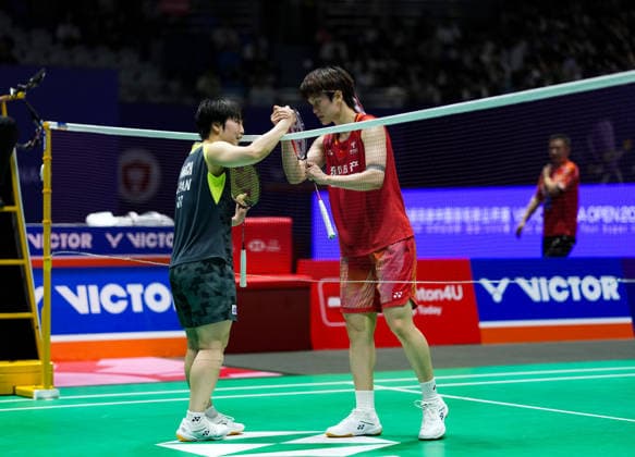 (260725) -- CHANGZHOU, July 25, 2026 -- Yamaguchi Akane (L) shakes hands with Wang Zhiyi after the women s singles semifinal match between Wang Zhiyi of China and Yamaguchi Akane of Japan at the 2026 China Open badminton tournament in Changzhou, east China s Jiangsu Province, July 25, 2026. ) (SP)CHINA-CHANGZHOU-BADMINTON-CHINA OPEN-WOMEN S SINGLES (CN) SunxFei 