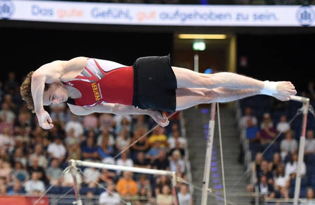 25.07.2026, xhbx, Turnen DM Finals 2026, Gerätfinals Männer v.l. Alexander Kunz (Boden) (DFL DFB REGULATIONS PROHIBIT ANY USE OF PHOTOGRAPHS as IMAGE SEQUENCES and or QUASI-VIDEO) Hannover *** July 25, 2026, xhbx, 2026 German Gymnastics Championships Finals, Men s Apparatus Finals, from left: Alexander Kunz, Floor Exercise. DFL and DFB regulations prohibit any use of photographs as image sequences and or quasi-video. Hanover