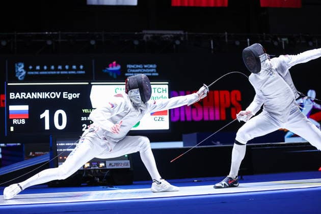 CHINA, HONG KONG - JULY 25, 2026: Russia s Yegor Barannikov (L) and the Czech Republic s Alexander Choupenitch compete in the men’s individual foil event at the 2026 Kerry Fencing World Championships. Mikhail Sinitsyn TASS  95427972
